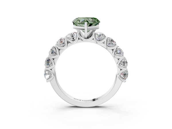 White gold Fancy Green Heart Cut Diamond Prong Setting with Side Stones on a Pave Band