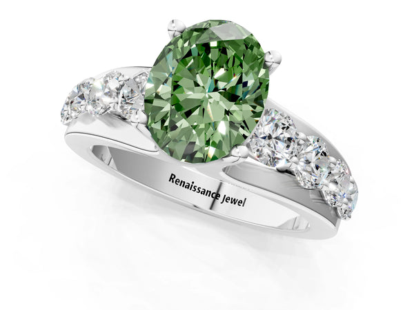 White gold Fancy Green Oval  Brilliant Solitaire with Side Stones on a Pave Band and Four-Prong Setting
