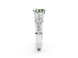 White gold Fancy Green Oval  Brilliant Solitaire with Side Stones on a Pave Band and Four-Prong Setting_63