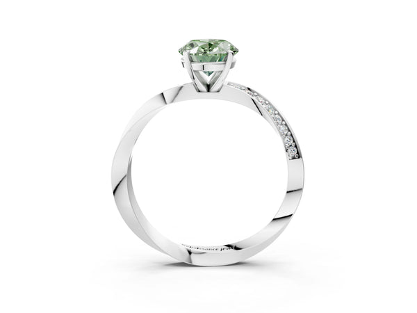 White gold Fancy Green Oval Cut Diamond Engagement Ring with Side Stone Accents and Four-Prong Setting