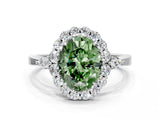 White gold Fancy Green Oval Cut Diamond Halo Ring with Pear Side Stones and Prong Setting_94