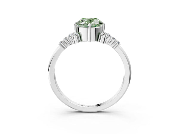 White gold Fancy Green Oval Cut Diamond Ring with Side Stones and Four-Prong Setting