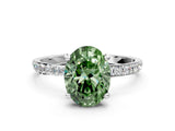 White gold Fancy Green Oval Cut Diamond Solitaire Ring with Round  Pavé Band and Prong Setting_149