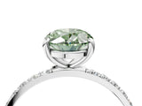 White gold Fancy Green Oval Cut Diamond Solitaire Ring with Round  Pavé Band and Prong Setting_154