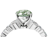 White gold Fancy Green Oval Cut Diamond Solitaire Ring with Side Stones and Four-Prong Setting_171