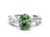 White gold Fancy Green Oval Cut Diamond Solitaire Ring with Twisted Band and Prong Setting_338