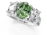 White gold Fancy Green Oval Cut Diamond Three-Stone Ring with Channel Set Band and Four-Prong Setting_62