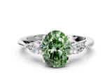 White gold Fancy Green Oval Cut Diamond Three-Stone Ring with Pear  Side Stones and Prong Setting_170