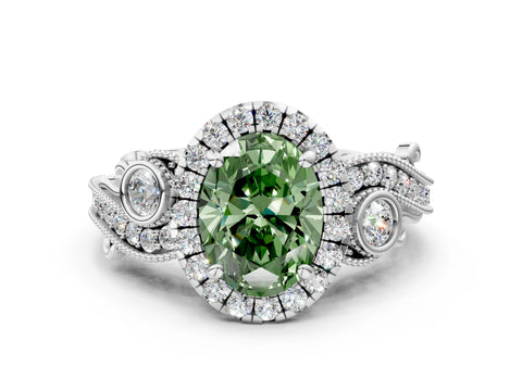 White gold Fancy Green Oval Cut Halo Diamond Ring with Milgrain and Bezel Accents on a Split Shank Band