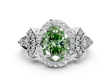 White gold Fancy Green Oval Cut Halo Diamond Split Shank Engagement Ring with Four-Prong Setting