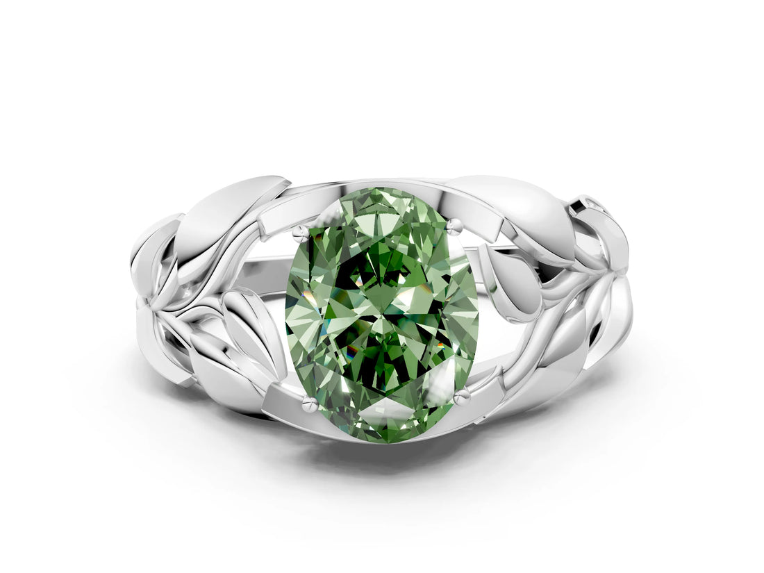White gold Fancy Green Oval Cut Solitaire Leaf-Inspired Engagement Ring with Prong Setting