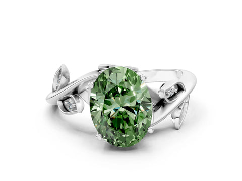 White gold Fancy Green Oval Cut Solitaire Twist Engagement Ring with Leaf Accents and Prong Setting