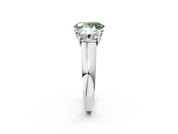 White gold Fancy Green Oval Cut Three-Stone Diamond Ring with Prong Setting on a Classic Band