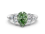 White gold Fancy Green Pear  Cut Diamond Cluster Ring with Round Accent Stones and Prong Setting on a Classic Band_51