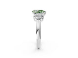 White gold Fancy Green Pear  Cut Diamond Cluster Ring with Round Accent Stones and Prong Setting on a Classic Band_52