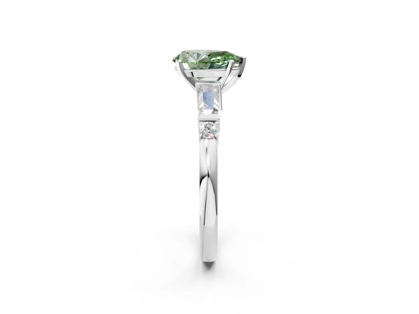 White gold Fancy Green Pear  Cut Diamond Ring with Baguette Side Stones, Channel Set Band, and Four-Prong Setting