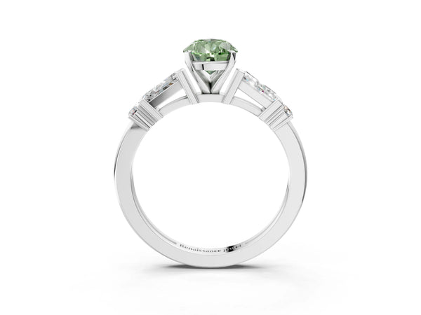 White gold Fancy Green Pear  Cut Diamond Ring with Baguette Side Stones, Channel Set Band, and Four-Prong Setting