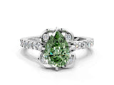 White gold Fancy Green Pear Cut Diamond Ring with Pavé Band and Floral Prong Setting_39