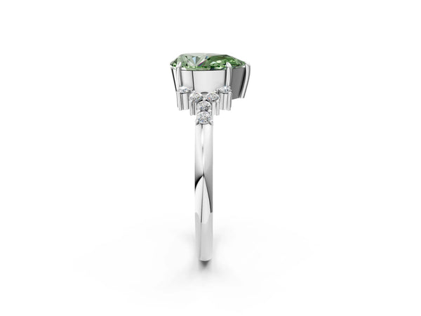 Platinum Fancy Green Pear Cut Diamond Ring with Side Stones and Four-Prong Setting