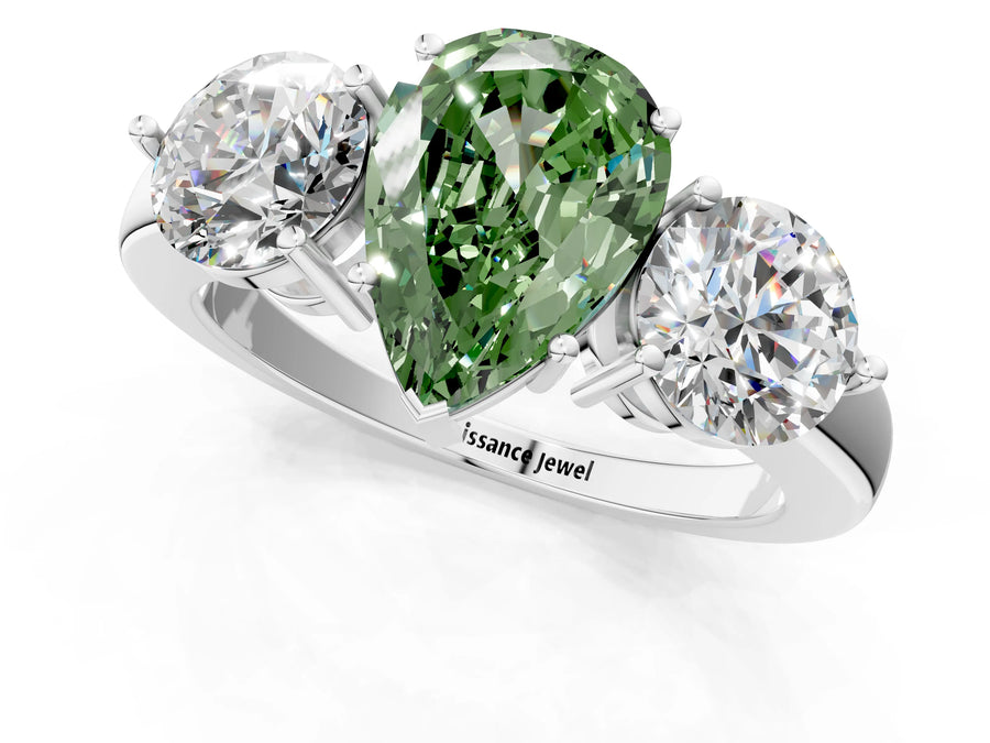 White gold Fancy Green Pear Cut Diamond Three-Stone Ring with Prong Setting and Classic Band