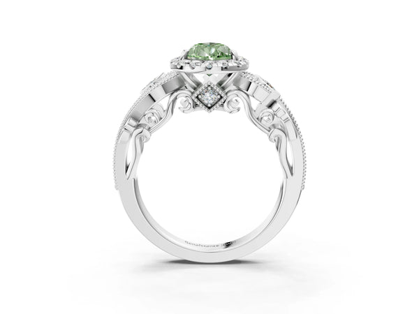 Platinum Fancy Green Pear Cut Halo Diamond Ring with Milgrain and Bezel Accents on a Split Shank Band