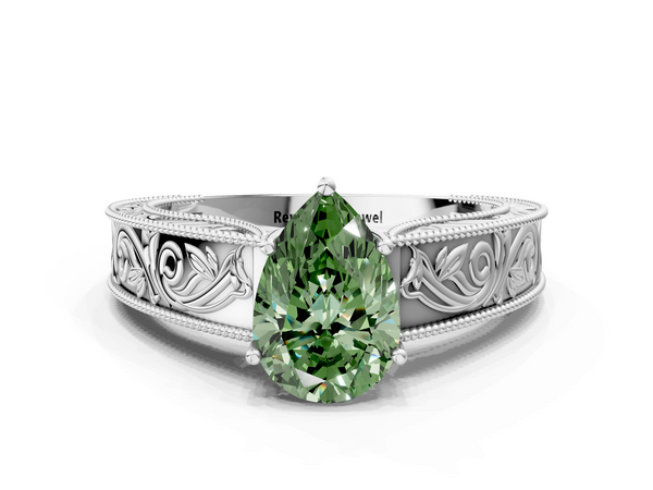 White gold Fancy Green Pear Cut Diamond Solitaire Ring with Engraved Band and Four-Prong Setting