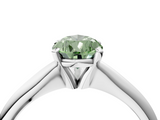 White gold Fancy Green Pear  Cut Solitaire Ring with Four-Prong Setting on a Classic Band_46