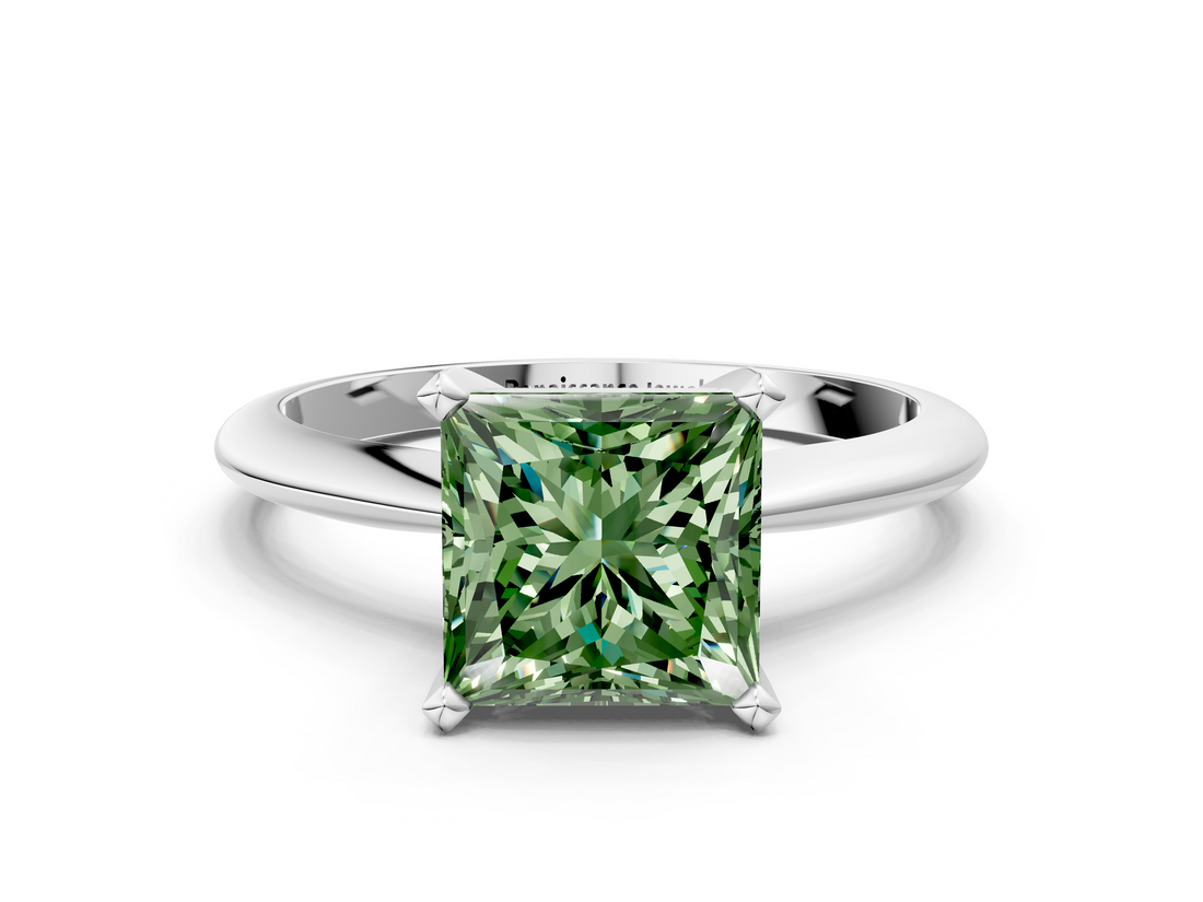 White gold Fancy Green Princess  Cut Solitaire Ring with Four-Prong Setting on a Classic Band