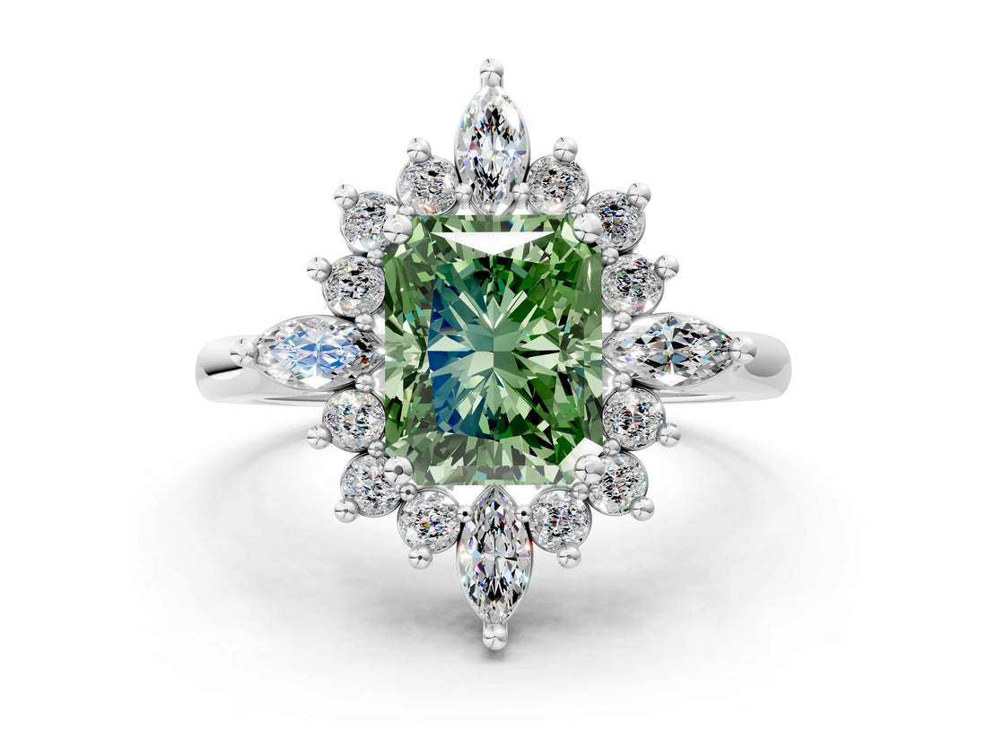 White gold Fancy Green Radiant Cut Halo Diamond Cluster Ring with Marquise and Round Stones on a White Gold Band with Prong Setting