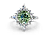White gold Fancy Green Round Cut Halo Diamond Cluster Ring with Marquise and Round Stones on a White Gold Band with Prong Setting