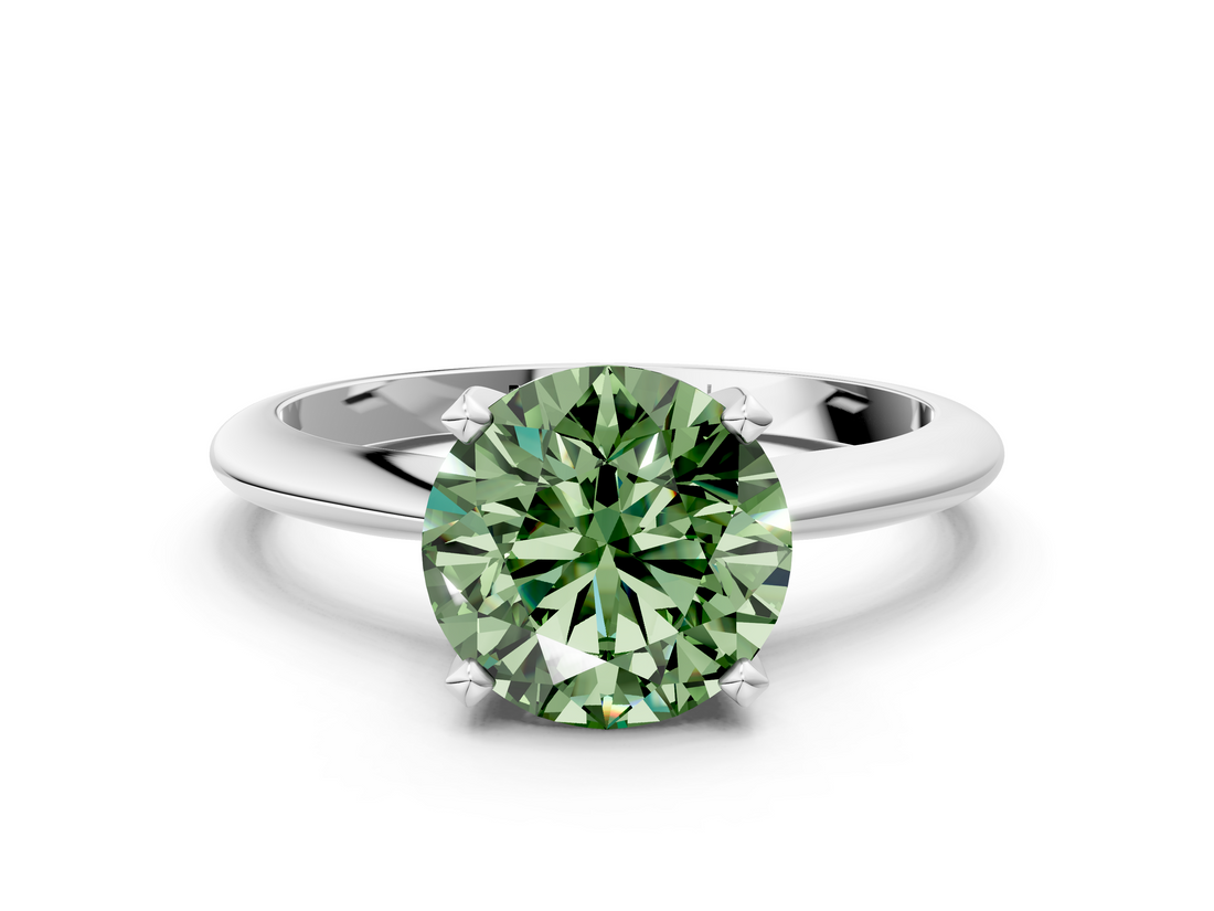 White gold Fancy Green Round  Cut Solitaire Ring with Four-Prong Setting on a Classic Band_62