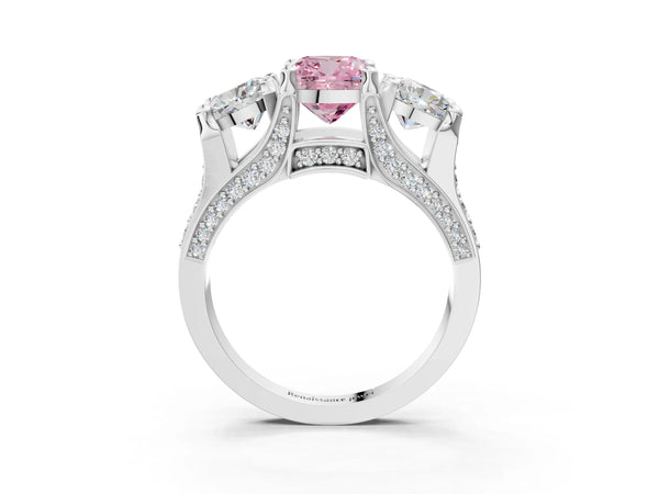 Platinum Fancy Pink Cushion Cut Diamond Three-Stone Ring with Channel Set Band and Four-Prong Setting