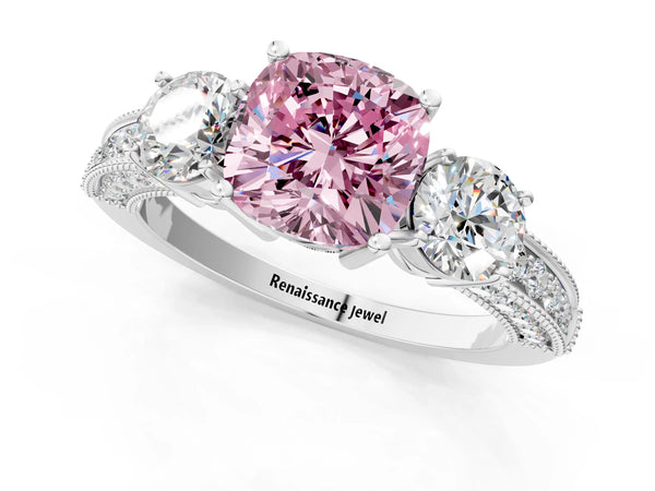 Platinum Fancy Pink Cushion Cut Three-Stone Diamond Ring with Pavé Band and Four-Prong Setting