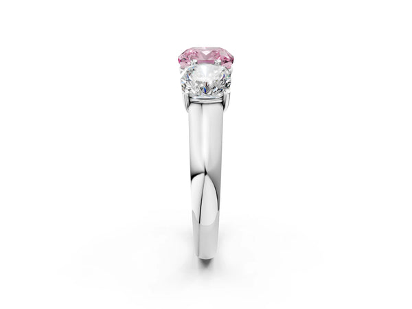 White gold Fancy Pink Cushion Cut Three-Stone Diamond Ring with Prong Setting on a Classic Band