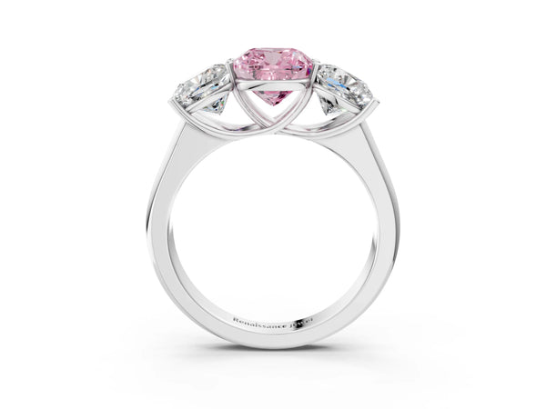 White gold Fancy Pink Cushion Cut Three-Stone Diamond Ring with Prong Setting on a Classic Band