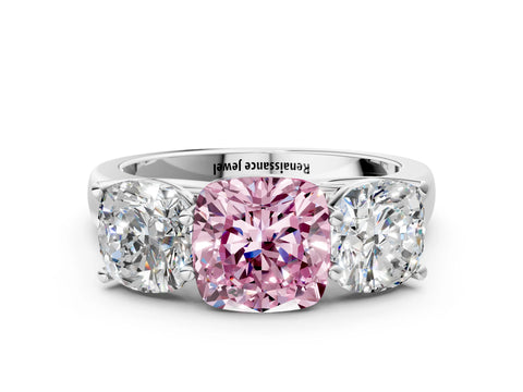 White gold Fancy Pink Cushion Cut Three-Stone Diamond Ring with Prong Setting on a Classic Band
