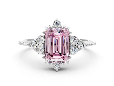 White gold Fancy Pink Emerald Cut Brilliant Diamond with Cluster Setting on a Beaded Band and Four-Prong Setting