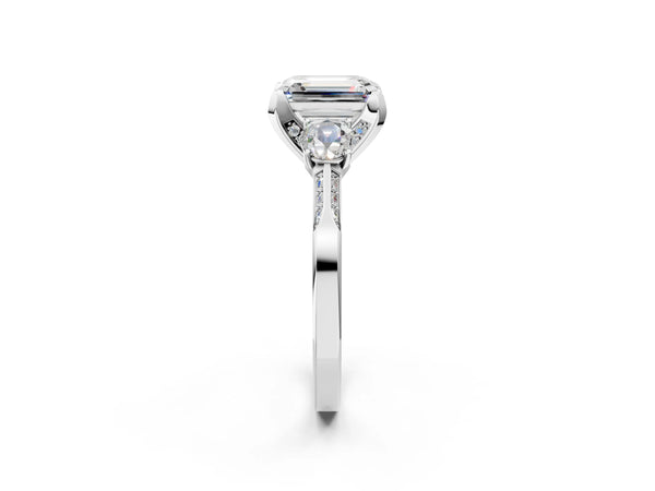 White gold Fancy Pink Emerald Cut Brilliant Three-Stone Diamond Ring with Pavé Band and Four-Prong Setting