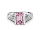 White gold Fancy Pink Emerald Cut Cut Diamond Channel Set Pave Band with Tension Prong Setting