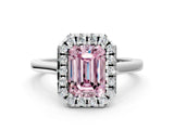 White gold Fancy Pink Emerald Cut Halo Round Diamond Solitaire Ring with Pavé Band and Four-Prong Setting