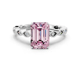 White gold Fancy Pink Emerald Cut Solitaire Diamond Ring with Infinity Twist Band and Four-Prong Setting