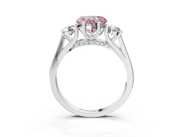 White gold Fancy Pink Heart Cut Diamond Three-Stone Engagement Ring with Prong Setting and Pavé Band