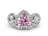 White gold Fancy Pink Heart Cut Diamond Three-Stone Halo Ring with Prong Setting and Pavé Accents