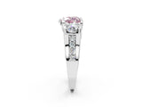 White gold Fancy Pink Heart Cut Diamond Three-Stone Ring with Channel Set Band and Four-Prong Setting_66