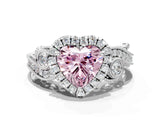 White gold Fancy Pink Heart Cut Halo Diamond Ring with Milgrain and Bezel Accents on a Split Shank Band