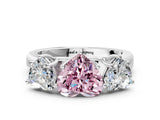 White gold Fancy Pink Heart Cut Three-Stone Diamond Ring with Prong Setting on a Classic Band_12