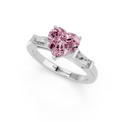 White gold Fancy Pink Heart  Solitaire with Tapered Baguette Side Stones on a Classic Band with Four-Prong Setting