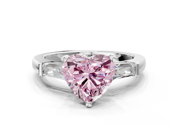 White gold Fancy Pink Heart  Solitaire with Tapered Baguette Side Stones on a Classic Band with Four-Prong Setting