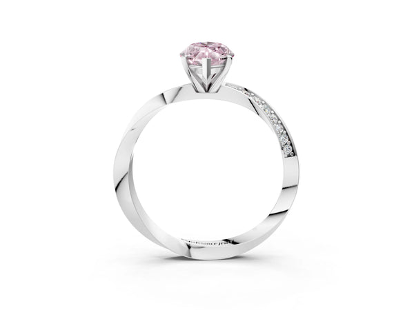 White gold Fancy Pink Marquise Cut Diamond Engagement Ring with Side Stone Accents and Four-Prong Setting