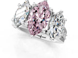 White gold Fancy Pink Marquise Cut Diamond Three-Stone Ring with Channel Set Band and Four-Prong Setting_79